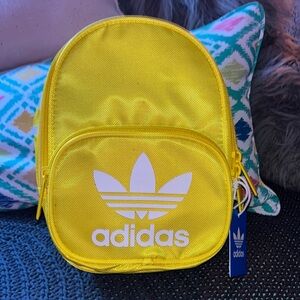 Yellow Adidas mini backpack
